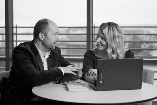 Black and white business meeting example